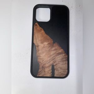 Carved iPhone 12 Pro phone case. Wood and resin.